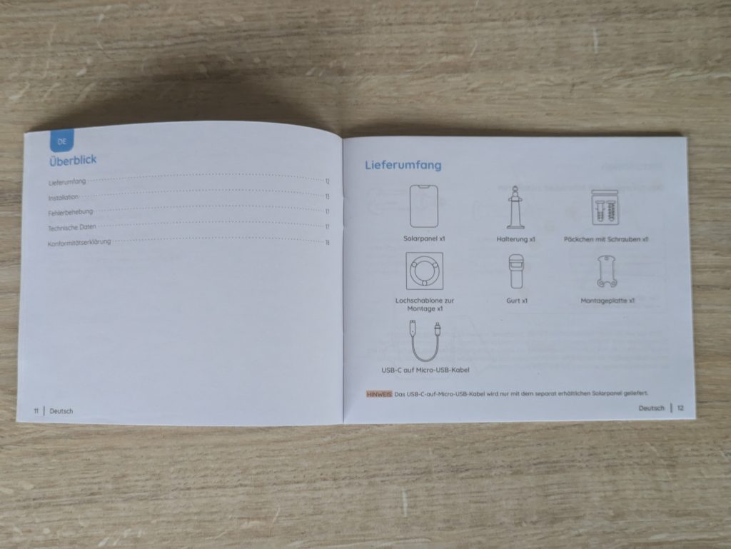 Geöffnete Anleitung des Solarpanels der Reolink Argus 4 Pro+ Überwachungskamera