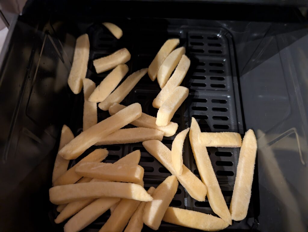 Braun TwinCook 5 Pro 3-in-1 Heißluftfritteuse Pommes frites in Garschublade