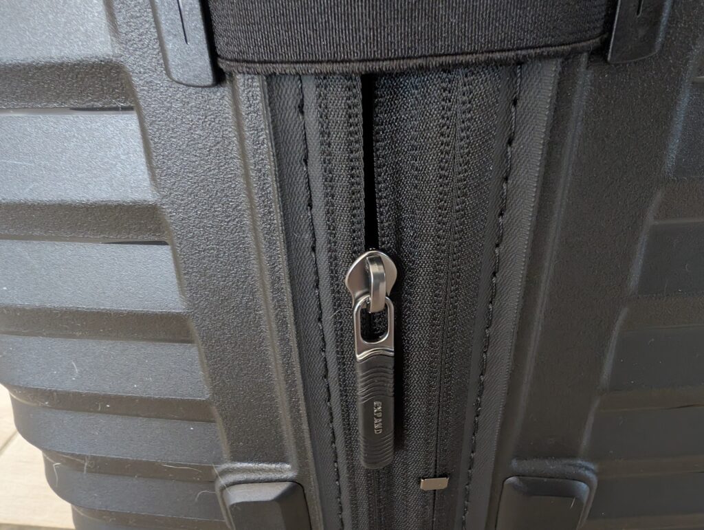 Samsonite Intuo Spinner L Koffer Zipper Dehnfalte geschlossen