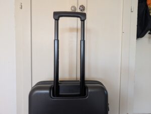 Travelite Basic Koffer Teleskopgriff ausgezogen halb