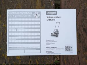 Garantiekarte des Scheppach SPM300 Spindelmähers