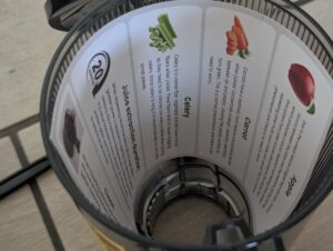 Fretta-Slow-Juicer Fruchtbehälter mit Merkblatt