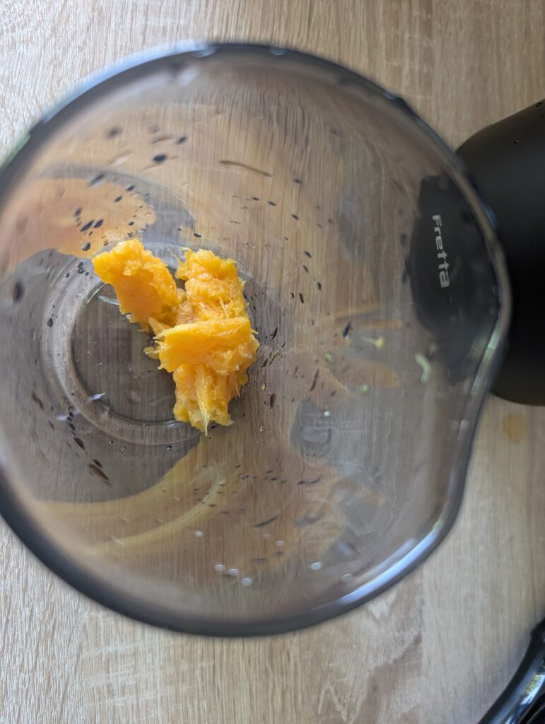 Fretta-Slow-Juicer Orangentrester im Behälter