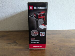 Verpackung der Einhell TE-ID 18 Li-Solo Schlagbohrmaschine von der Seite