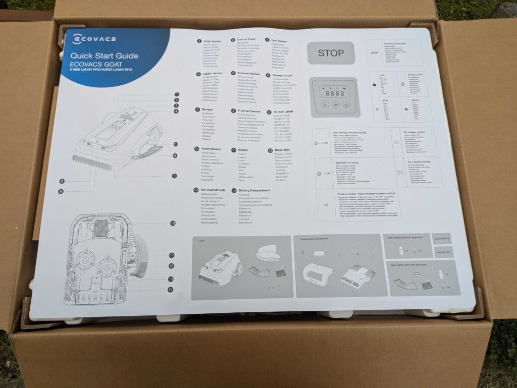 Verpackung des ECOVACS Goat A1600 LiDAR PRO Mähroboters geöffnet mit Anleitung