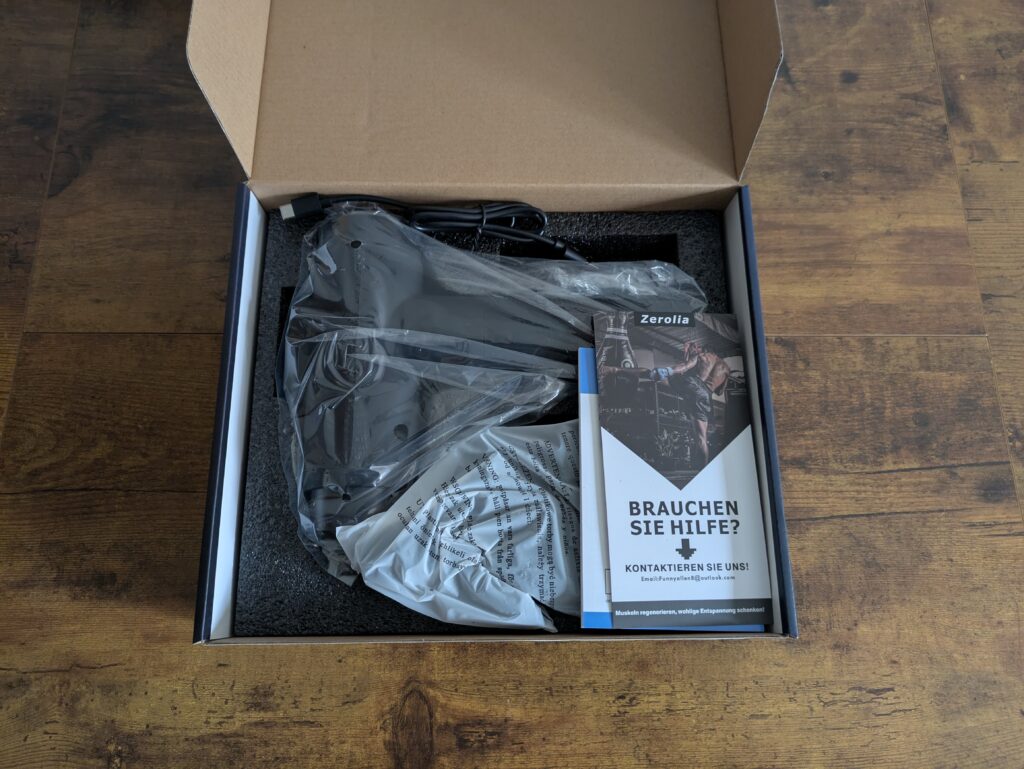 Verpackung der Zerolia MG 03 Massagepistole geöffnet
